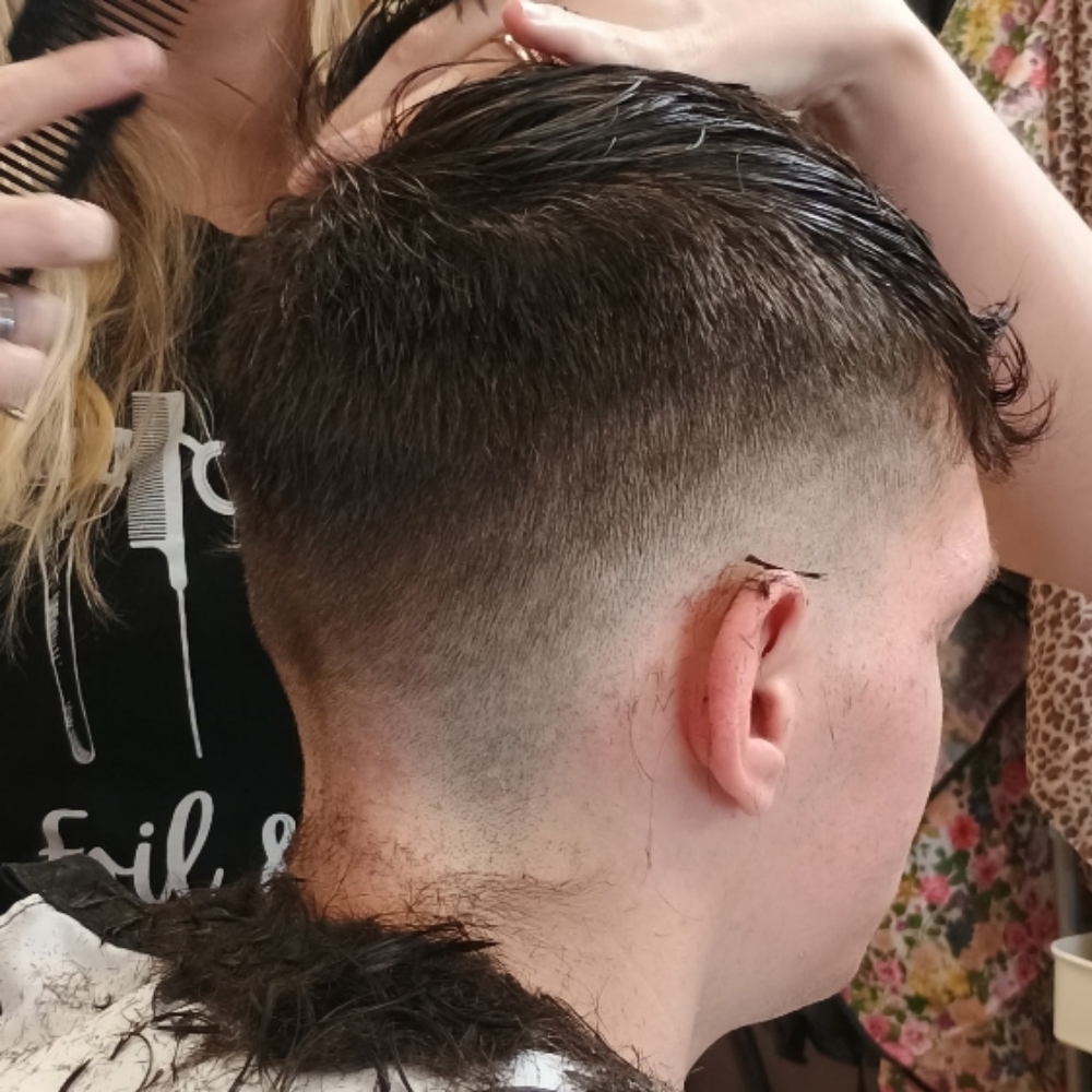 The Signature Cut For Men at Foil And Fade Modern Hair Studio in Oneida, TN