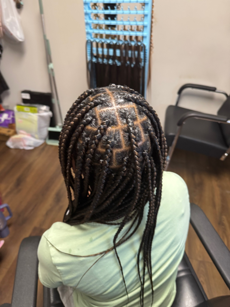 Medium Knotless Braids (kids) at BluDiamond Braids in Fort Pierce, FL