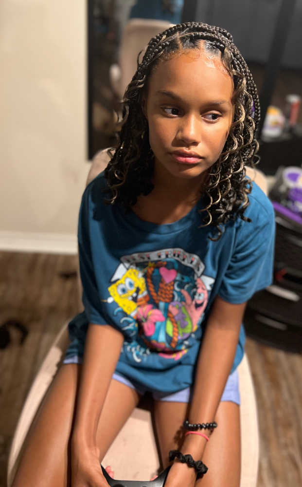 Kid Medium boho knotless at Braided Perfection in Fayetteville, AR