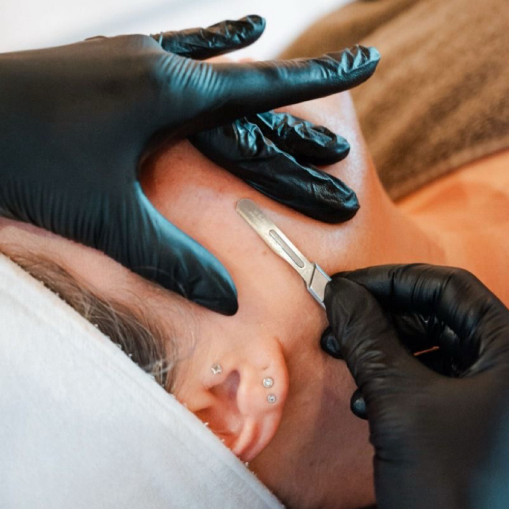 Tier 2: Illuminate Facial at NKD SKN Headspa + Esthetics in Lees Summit, MO