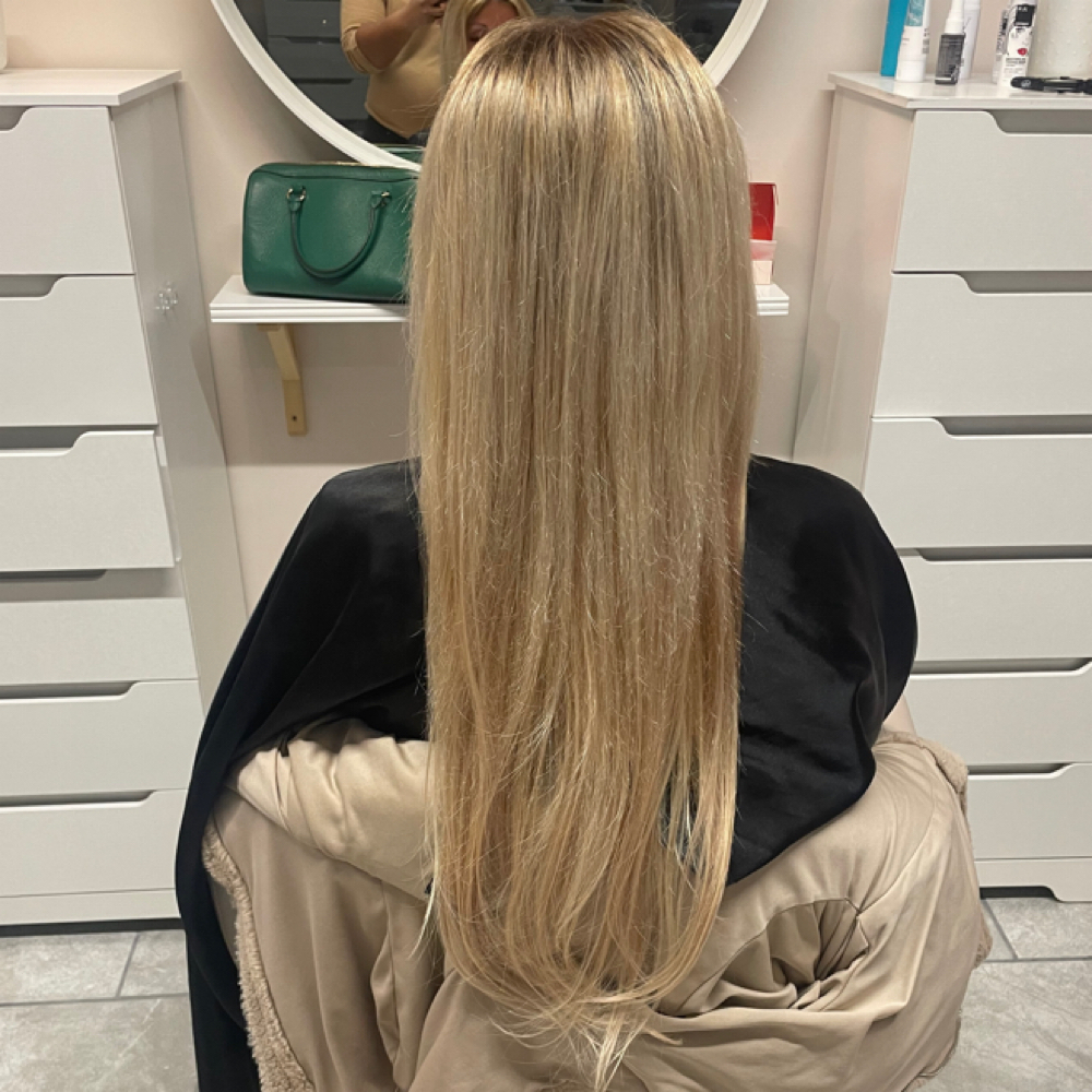 One Row Weft Extensions at Pink Door Salon in Taylor, MI
