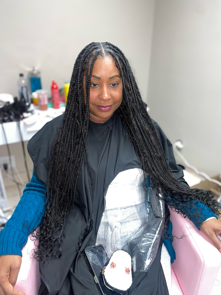 Small Knotless Braids at Crowned Beauty Studios LLC in Detroit, MI