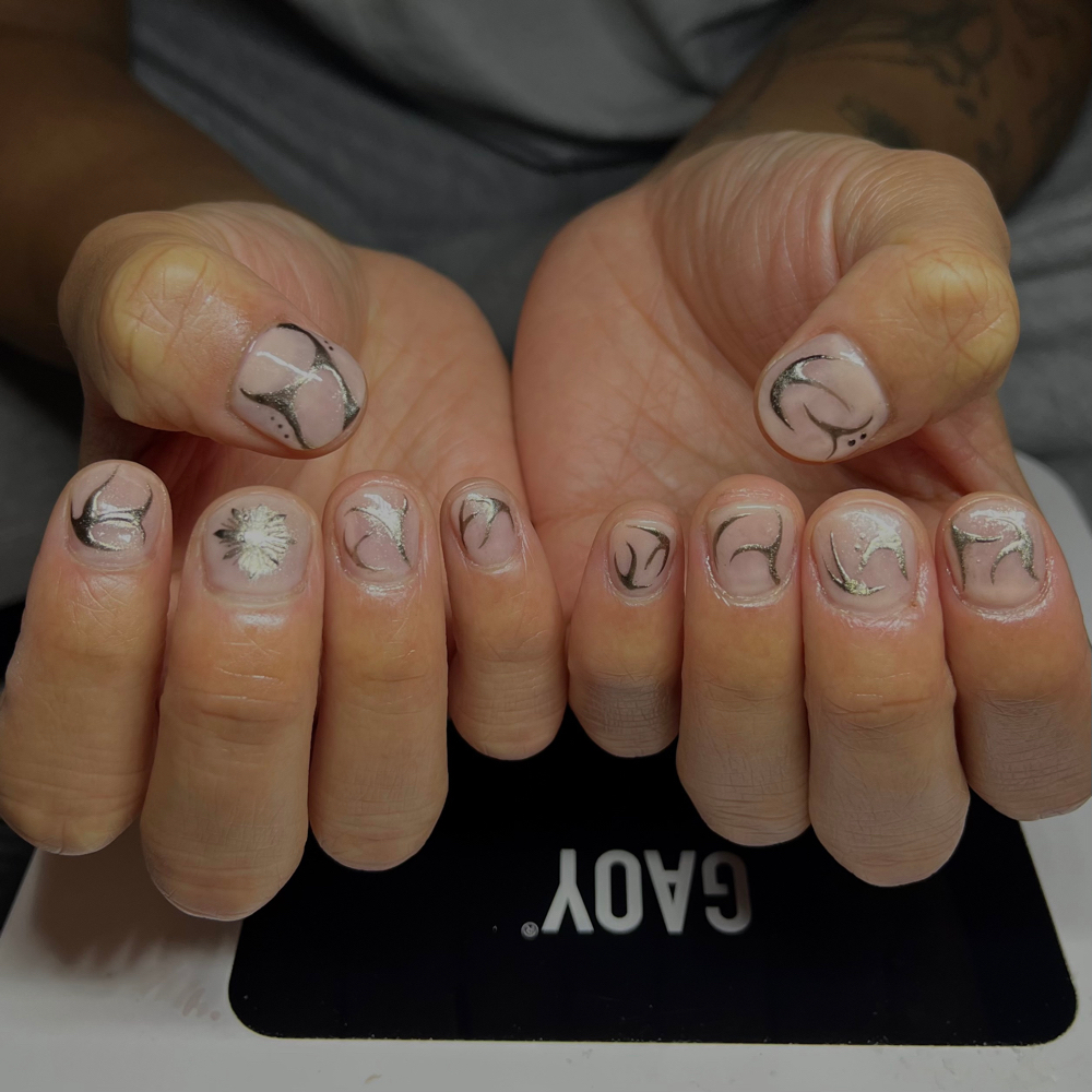 Men's Basic Manicure at Lala + Co. Beauty Parlor in LANSING, MI