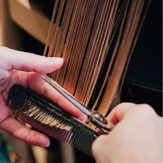 The Revival Cut Treatment Package at Blonde Ambition Salon in Raleigh, NC