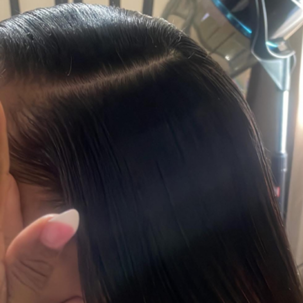 Partial Sew-in at Royal Miss Braids and Beauty in Battle Creek, MI
