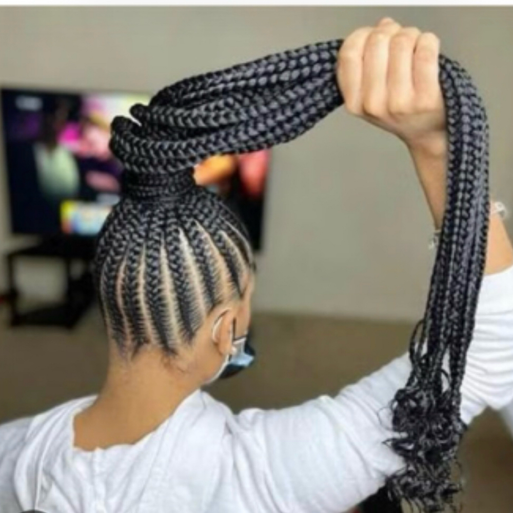 (M) Braided Ponytail Bra Length at Candy’sbraidingsalon in detroit, MI