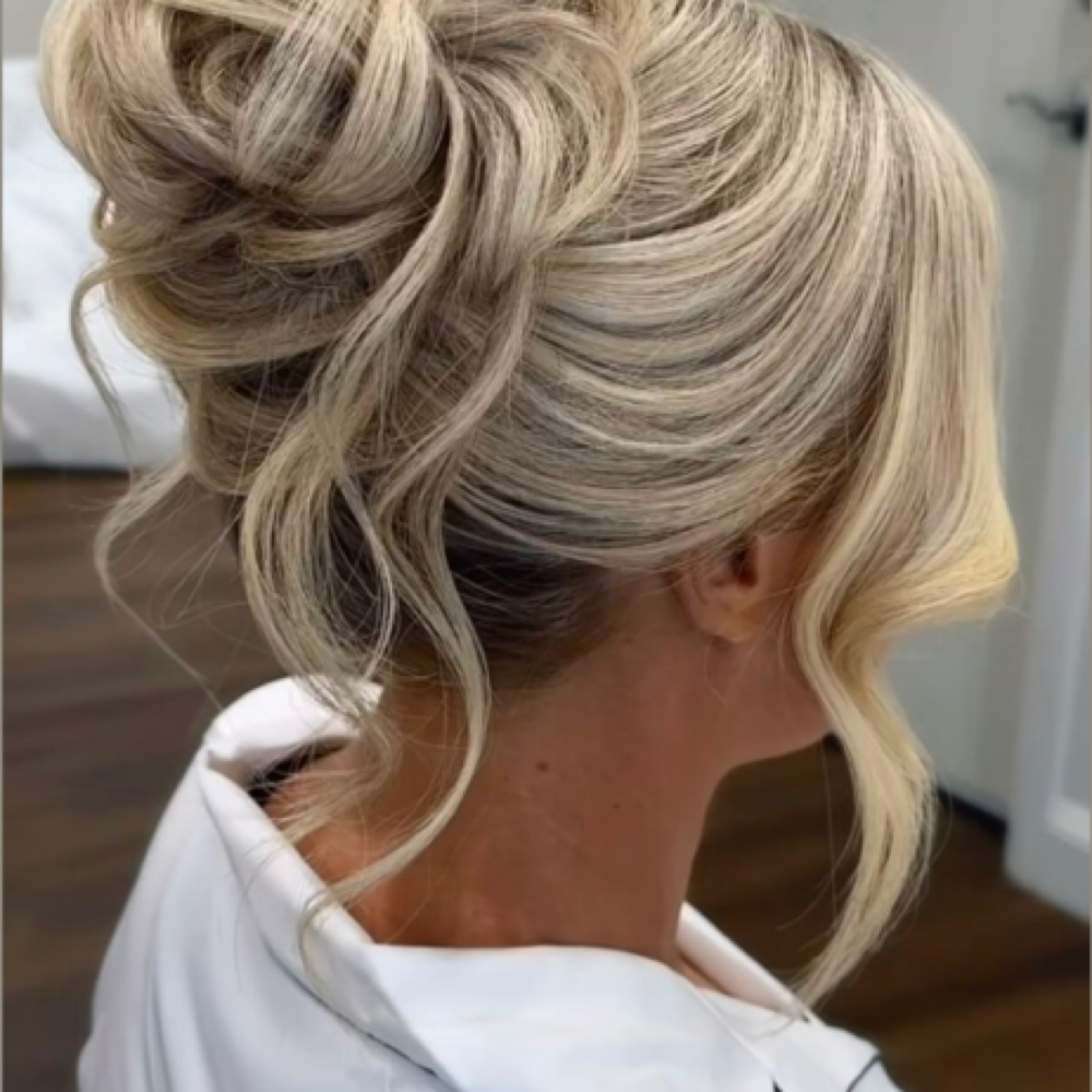Formal updo and makeup at Beyond Polish Beauty Salon in Selmer, TN
