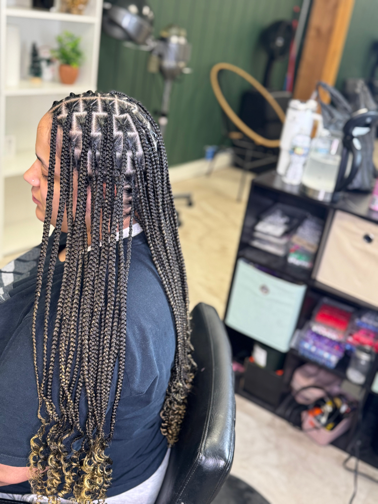 Smedium Knotless at Hair Cartel in South Bend, IN