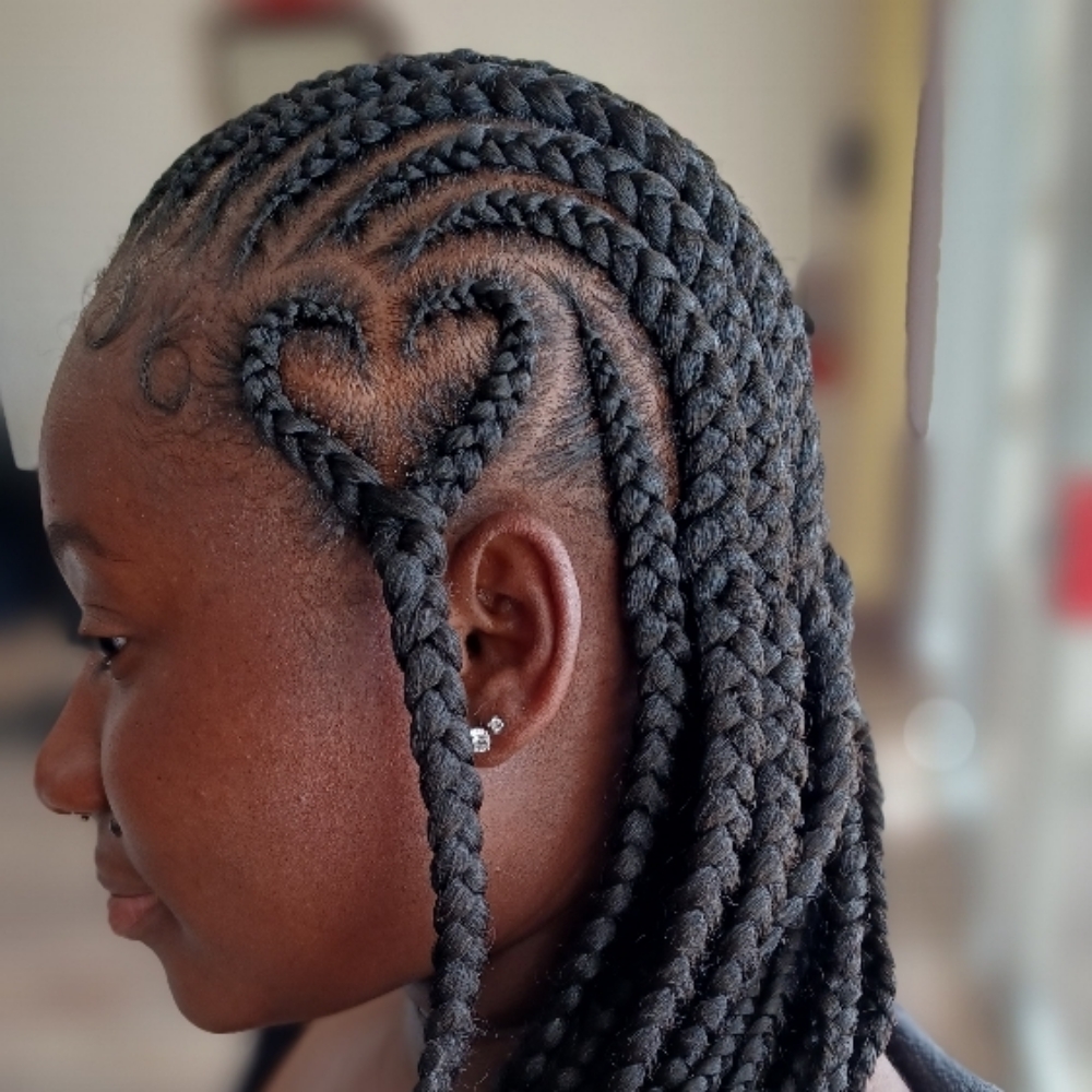 Cornrows With added hair at Amazing Kinkz in Detroit, MI