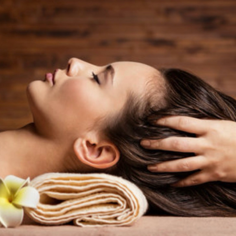 Relaxing Scalp Massage at Malik’ah NYC in Garden City, NY