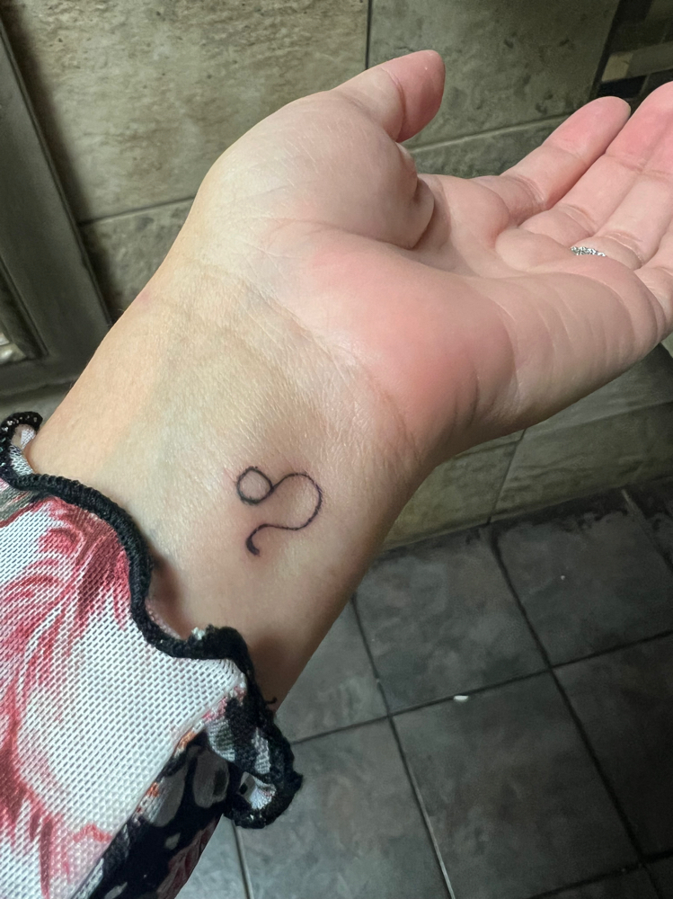 Fine Line Tattoo