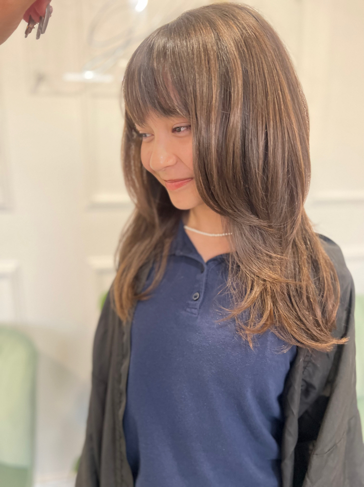 Bang Trim at Savage Styles hair & makeup in El Paso, TX