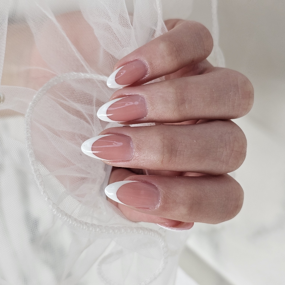 Chic white French manicure from fle