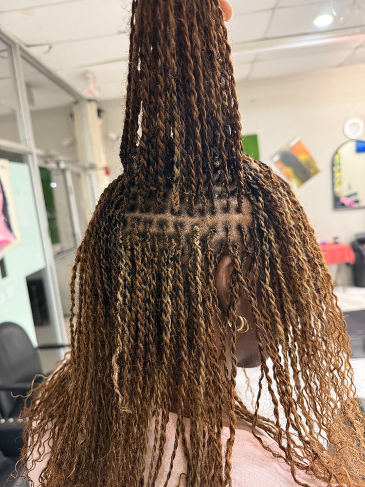 Micro Lock at African Queen Hair Braiding in Beaumont, TX