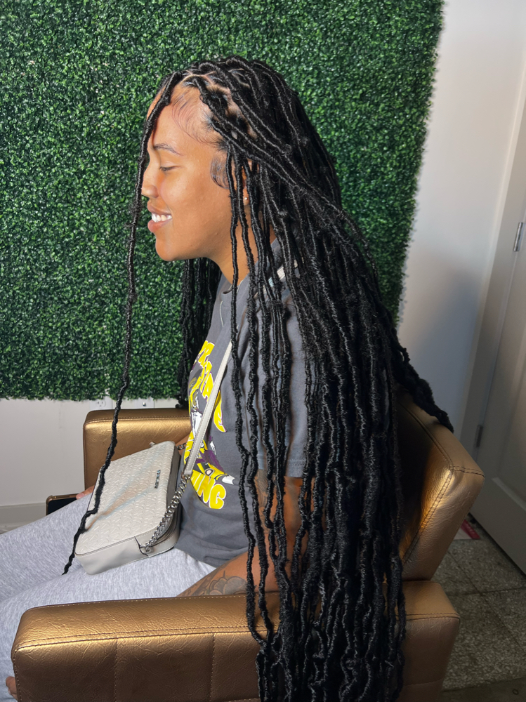 extended soft locs at braidsbyderri in atlanta, GA