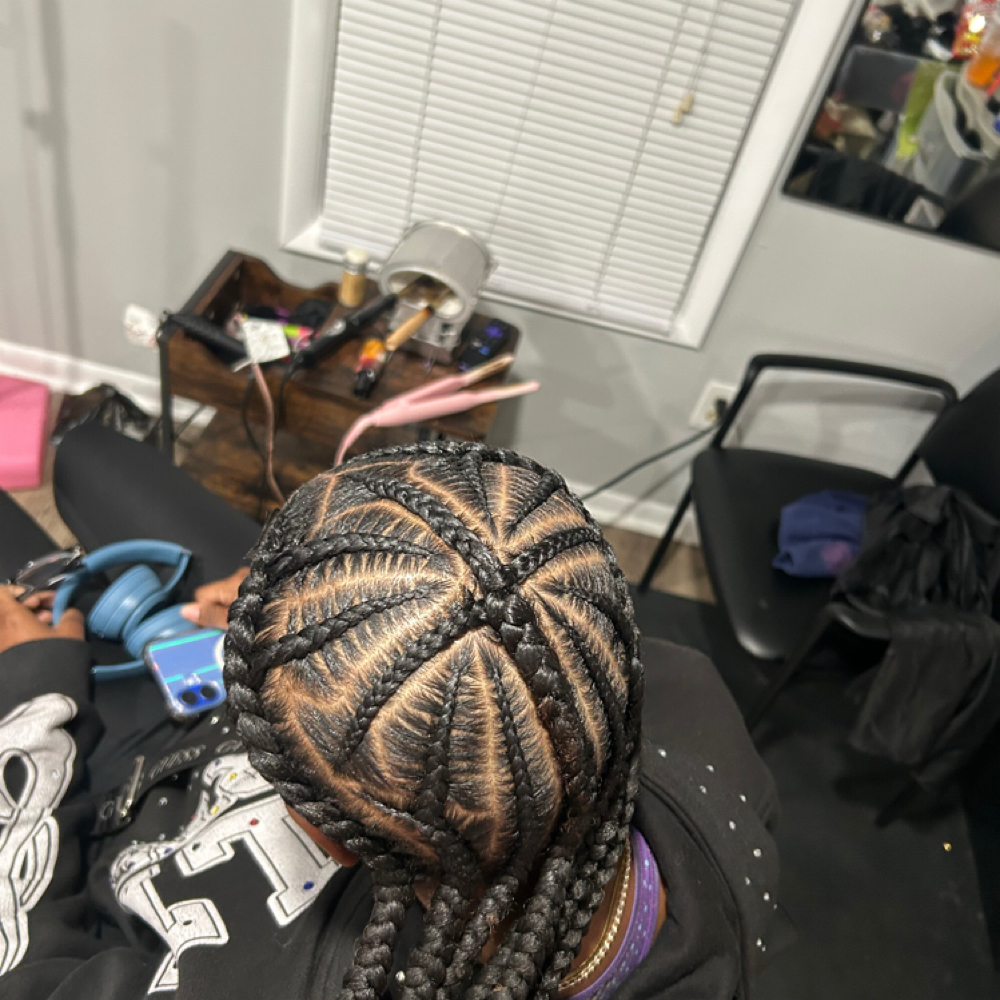 Chrome heart design braids at The Hairapist Experience in Mount morris, MI