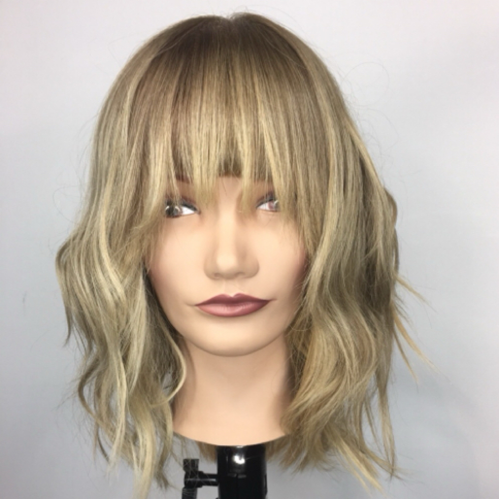 Bang Trim at Colorize Hair Studio in Gluckstadt, MS