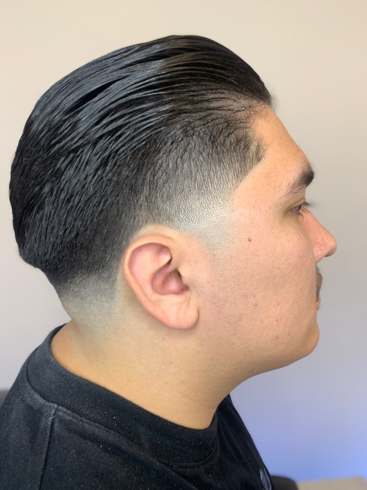 Mid Taper Fade + Pompadour hairstyl