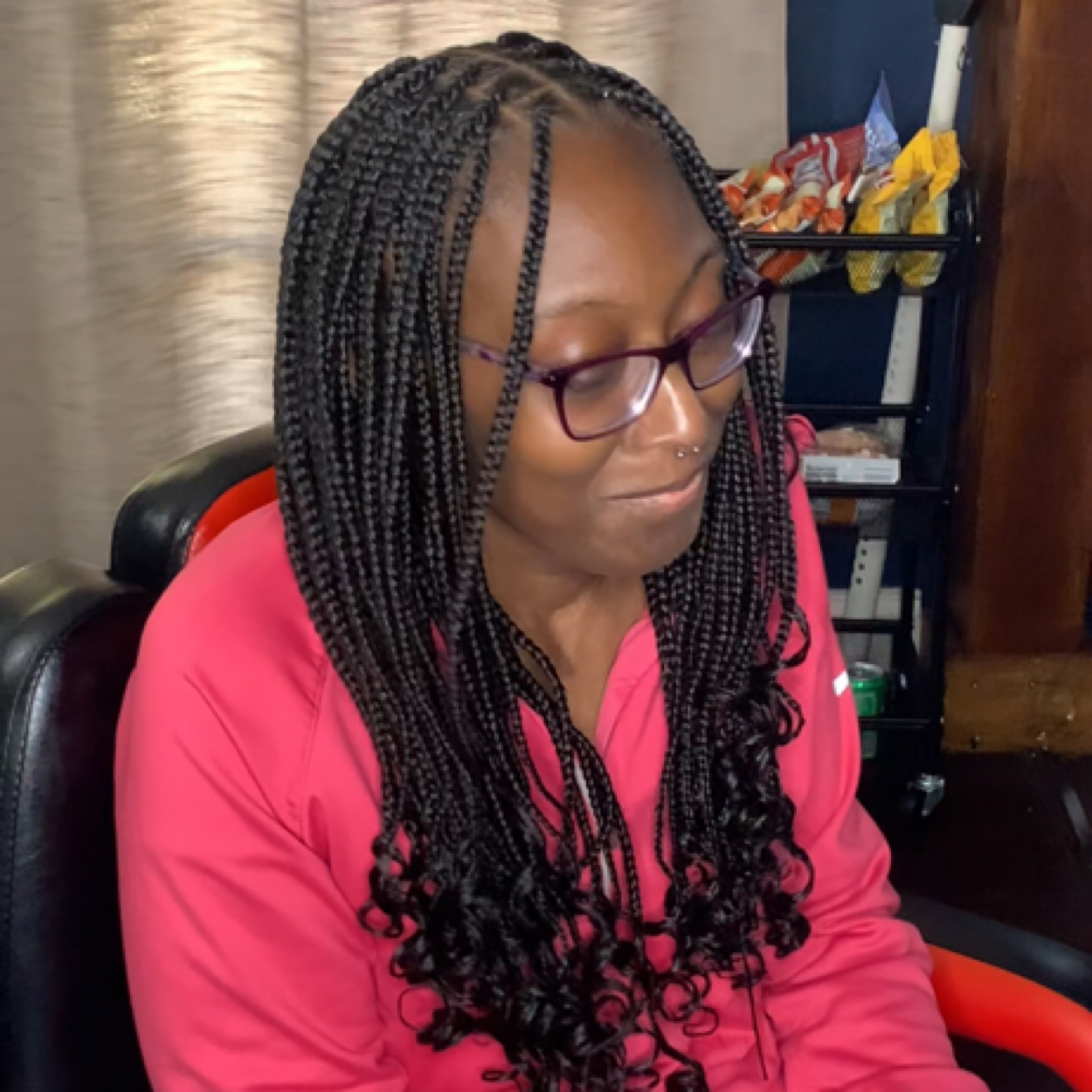 Small Knotless (Mid Back) at Charming Clean Braids in Fayetteville, NC