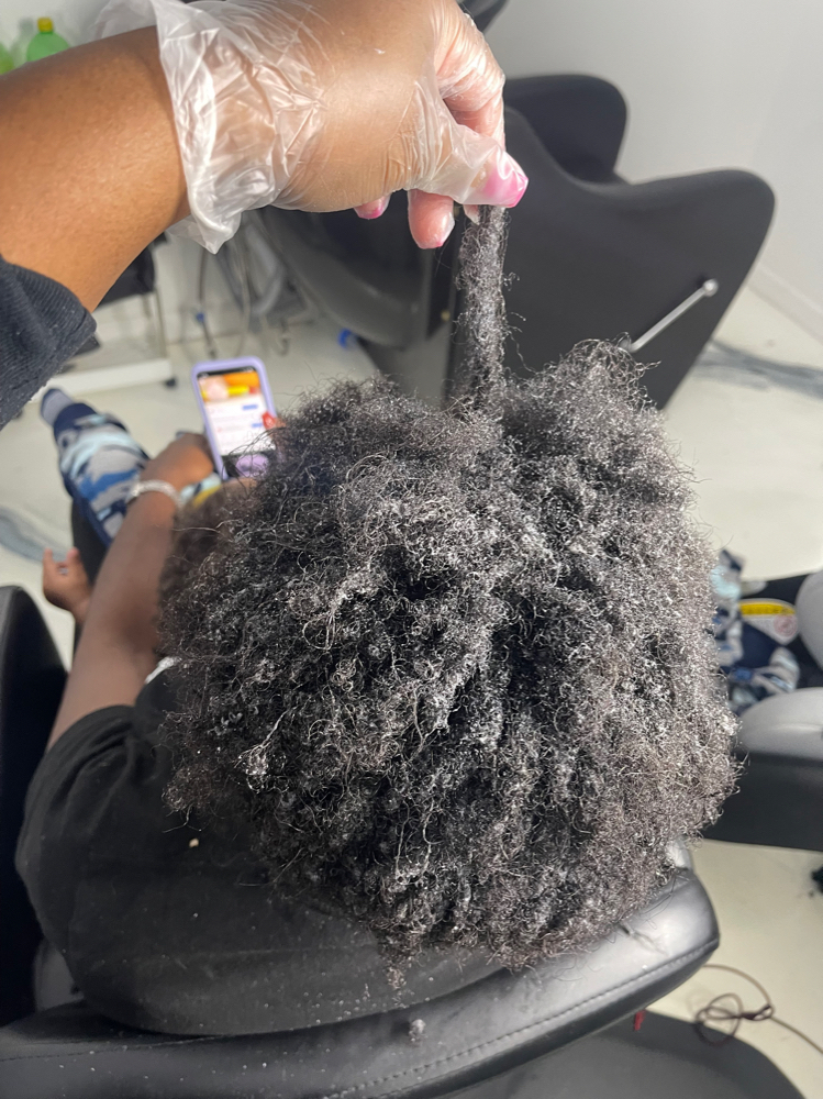 Loc Comb-Out $45 Per Hour