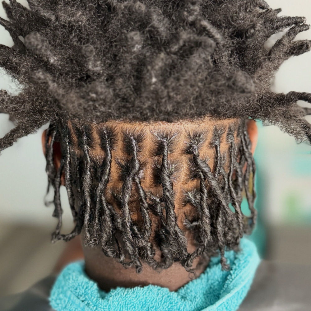 Locs Retwist {Half Head} at Queen JujuBee’s Beauty in Riverside, CA