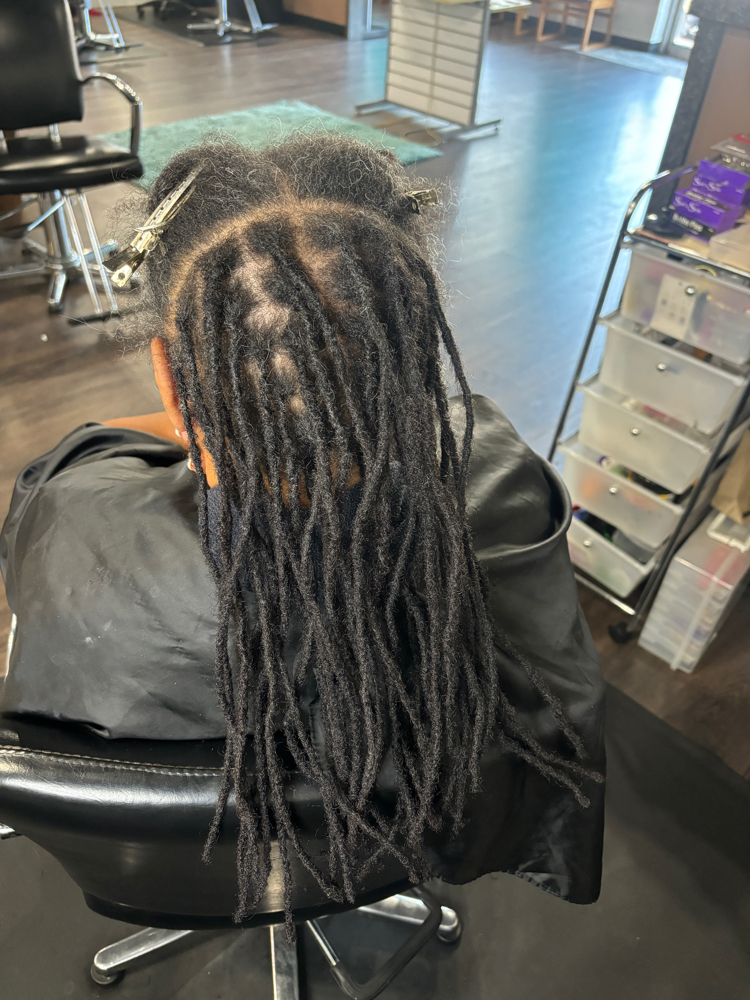 Loc Extension at Crowned By Qunda in Columbia, SC