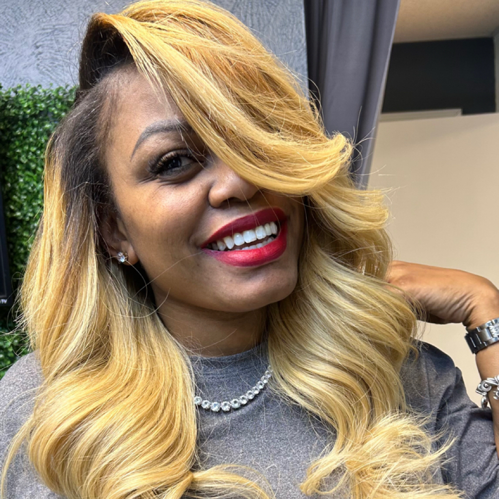 sew in with natural leave out at TheBraider Hair Academy in Duncanville, TX