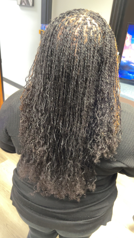 Sister Locs Retighten at The Xperience Salon & Spa in Murfreesboro, TN