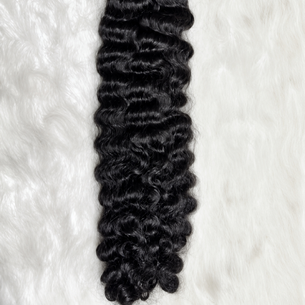 Lavish Loose Curls at Chi’ Styles in Del City, OK
