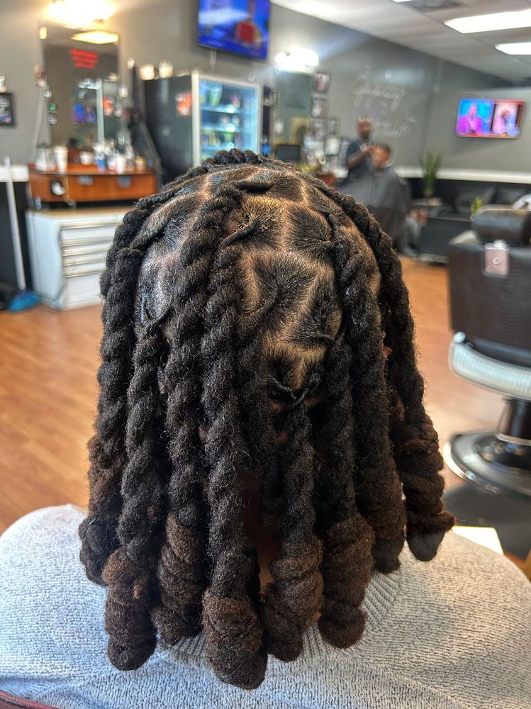 Premium Loc Retwist And Style at Epiphany South BarberShop in Savannah, GA