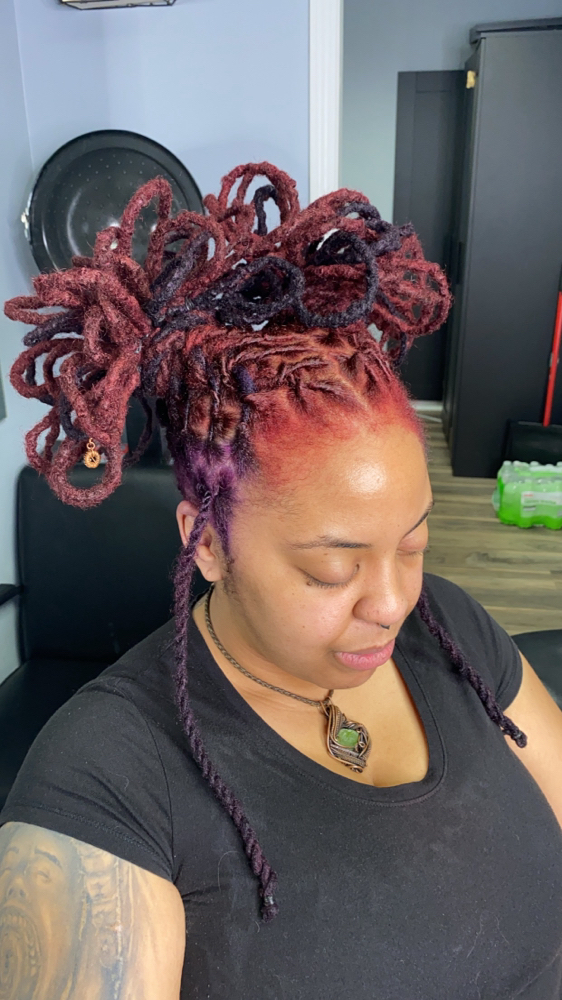 Petal Bun / Bun Styles at The Naturlist Locd Queen in Indianapolis, IN