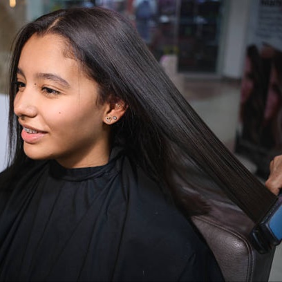 Silk Press/Smoothing treatment at Blossoms HTX Hair Studio in Spring, TX