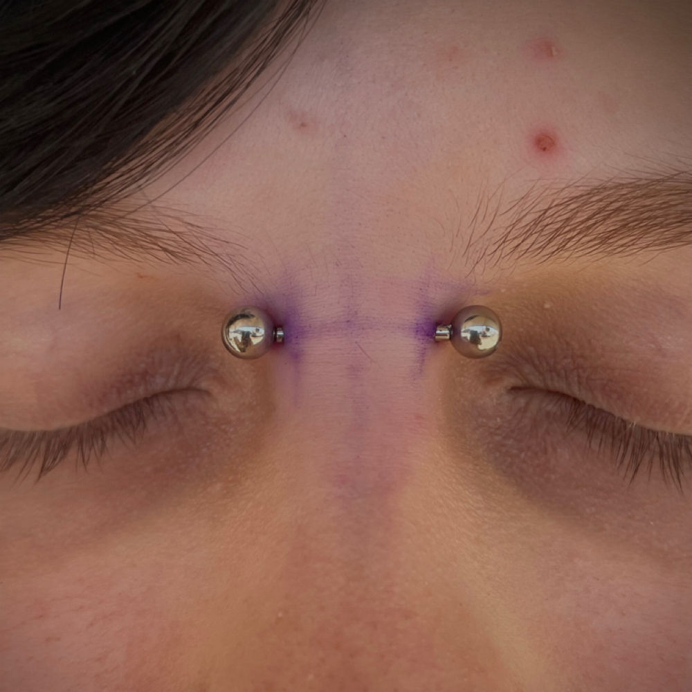 Bridge at Dark Age Piercings by Sarah in Denton, TX