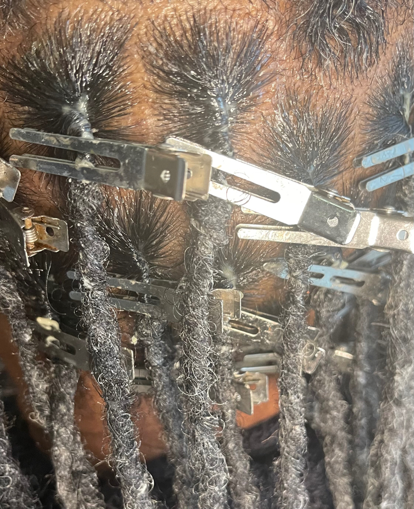 Retwist Of Dreads