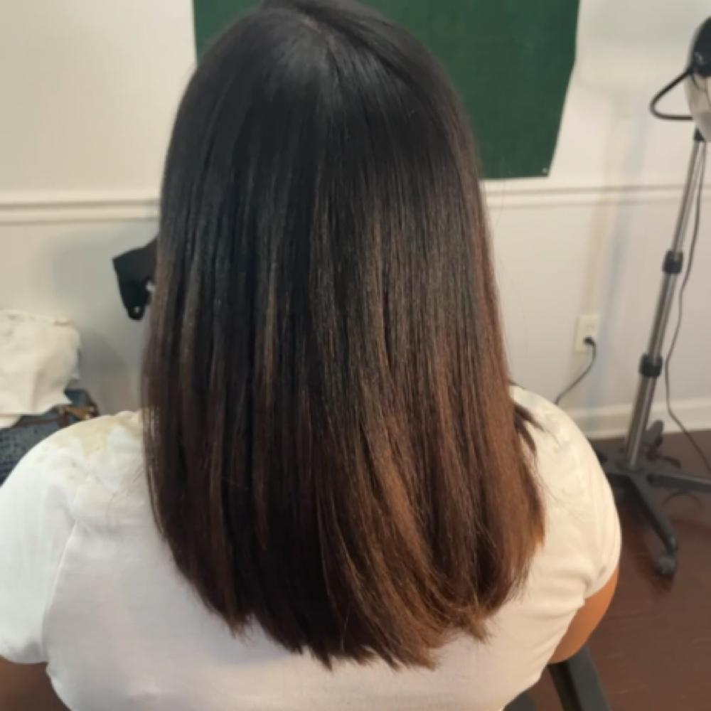 Trim at Simply Beautiful Hair Care in Lithonia, GA