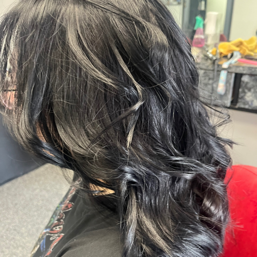Women's haircut at Cosmo Cat in Colorado Springs, CO