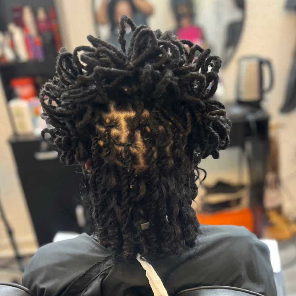 Loc Retwist + Exclusive Style at Locs  by queen in Cleveland, OH