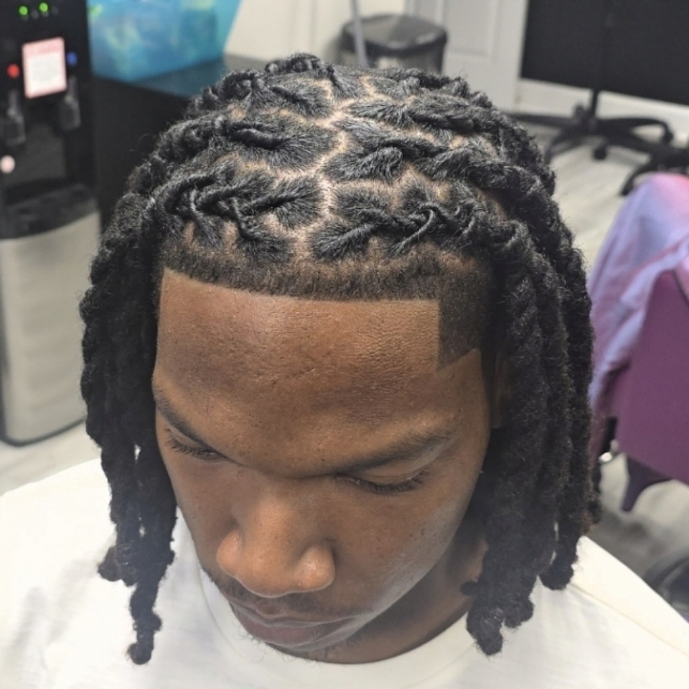 Loc retwist at The collective salon and barber spa inc in Locust Grove, GA