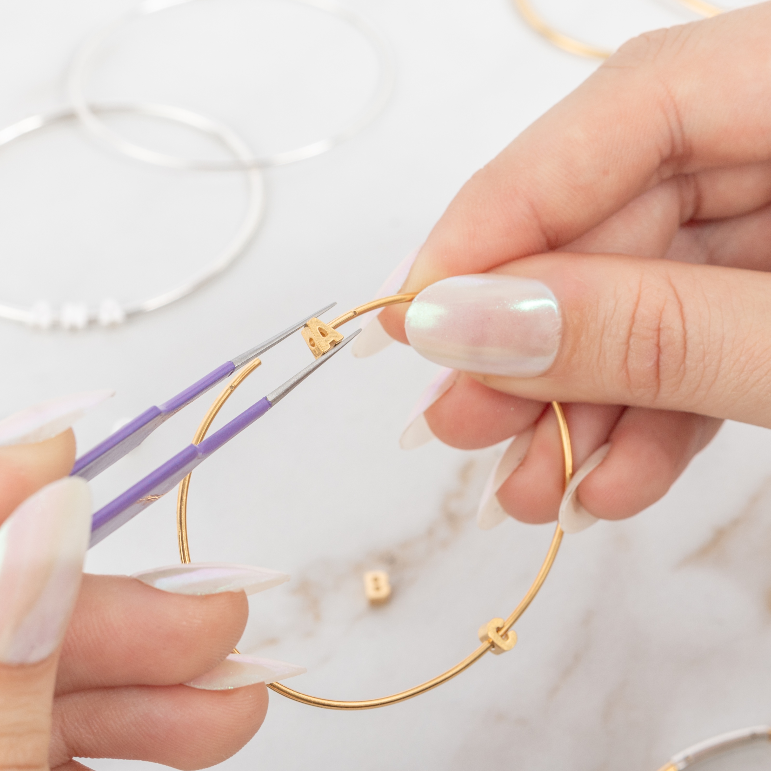 Bangle Charm Letter at STITCH. Hair Atelier in Madera, CA