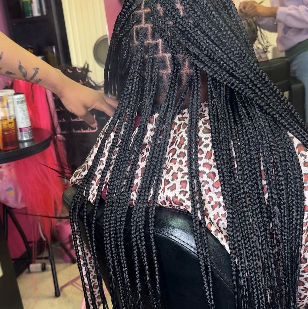 small knotless- lower back length
