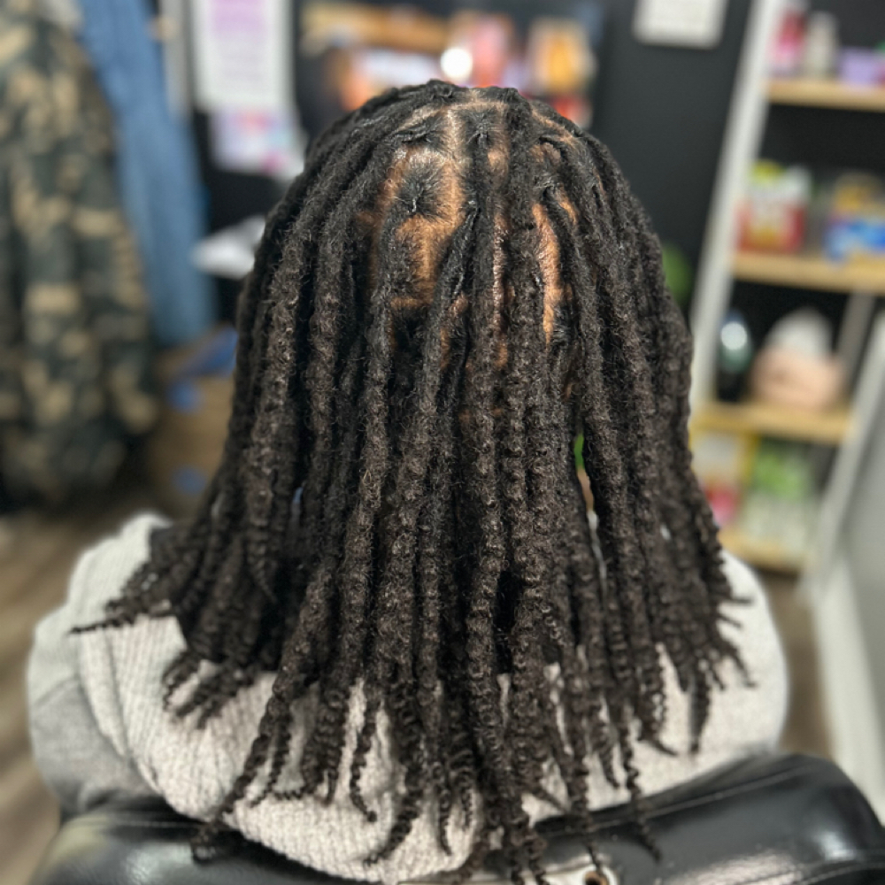 Loc Extensions at Curl Conscious by Nique in Raleigh, NC