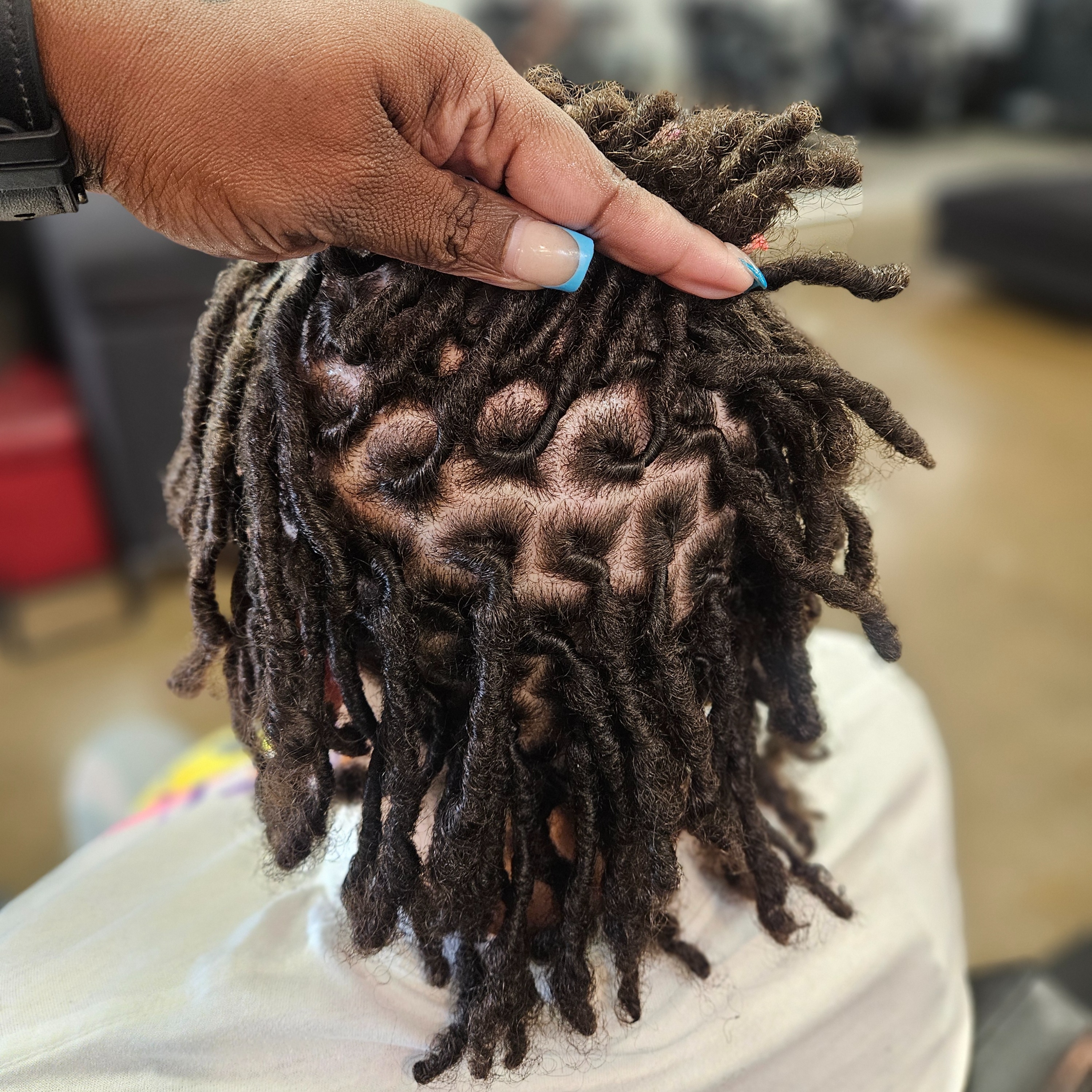Retwist at Mane Attraxion Beauty in Indianapolis, IN