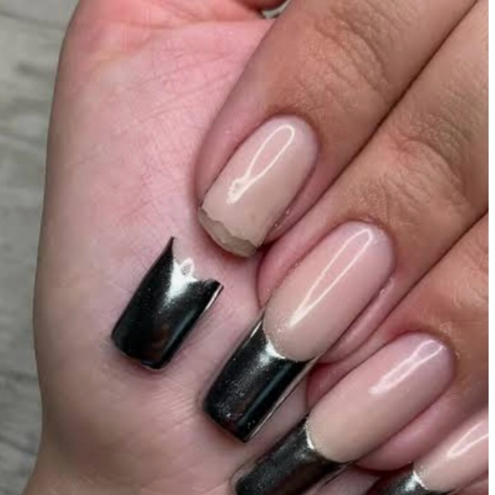 nail fix at Tiff-tastic’s Salon and Spa East in Battle Creek, MI