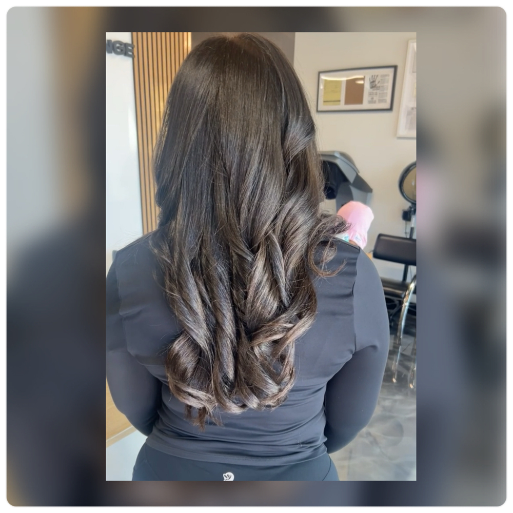 Silk Press (mid back/bra strap) at BeautyByTee in Austin, TX