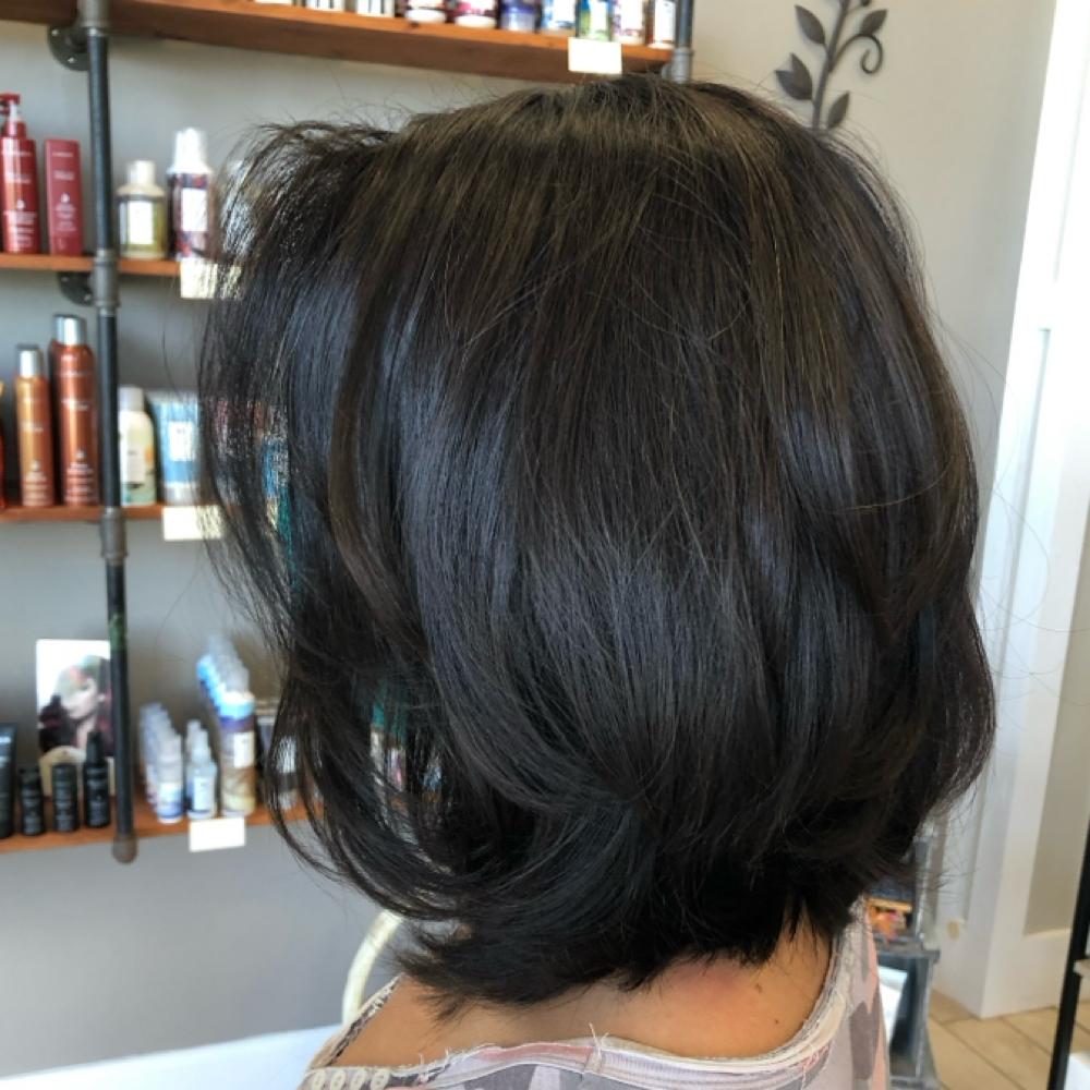 RETOUCH at Blown Away Hair Lounge in Spring Hill, FL