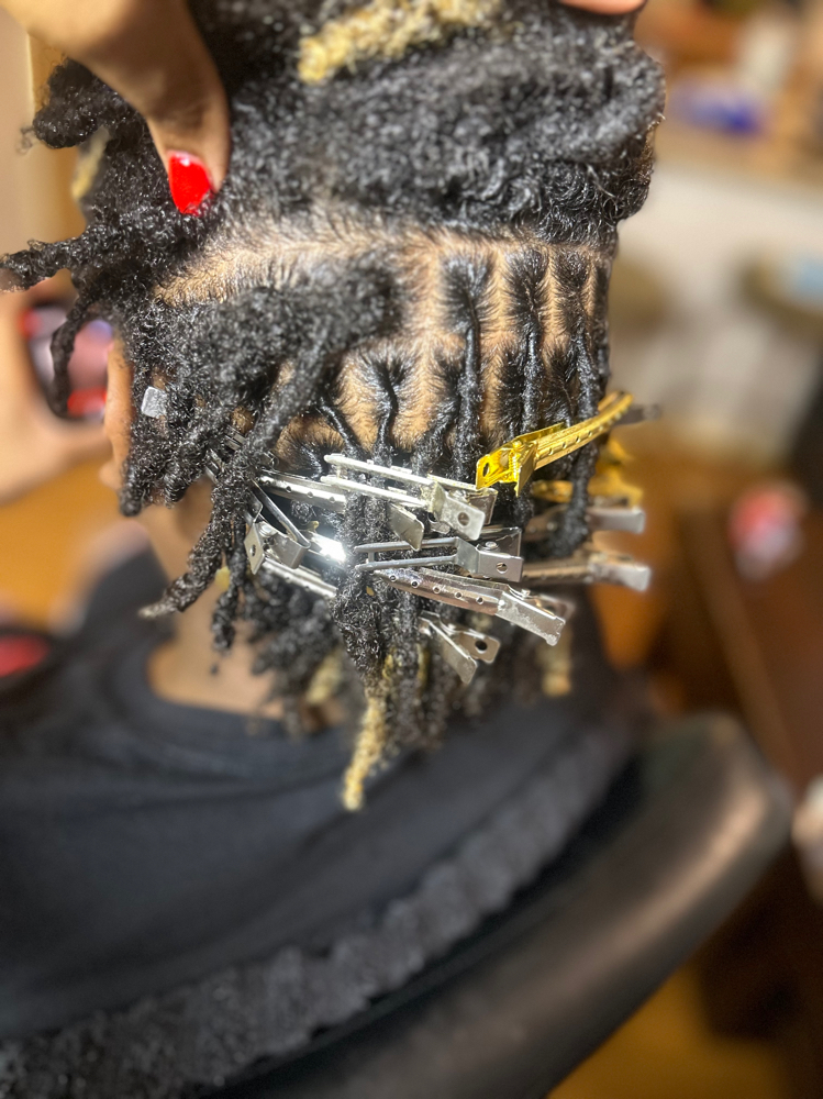 Starter locs/dreadlocks at DEE3 STYLEZ in Milwaukee, WI