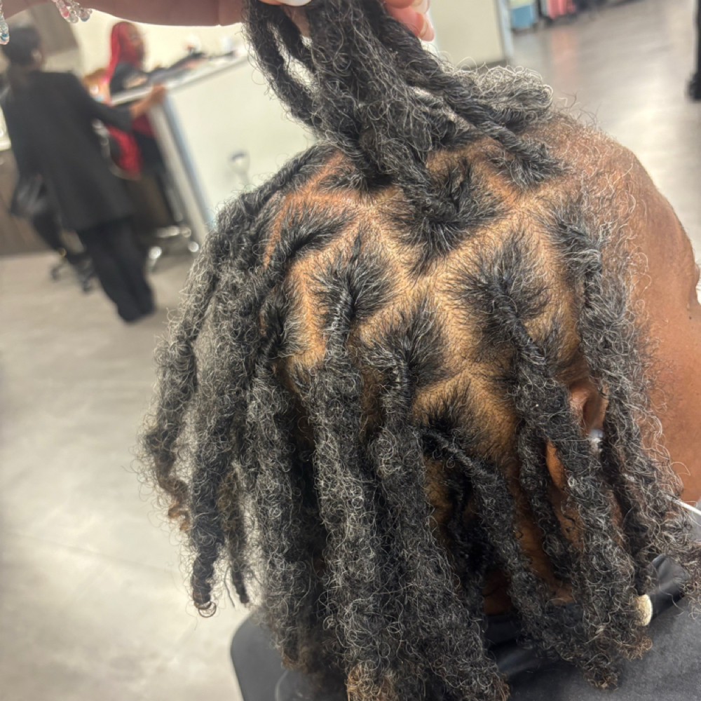 loc retwist at KP Hair Studio in columbia, SC