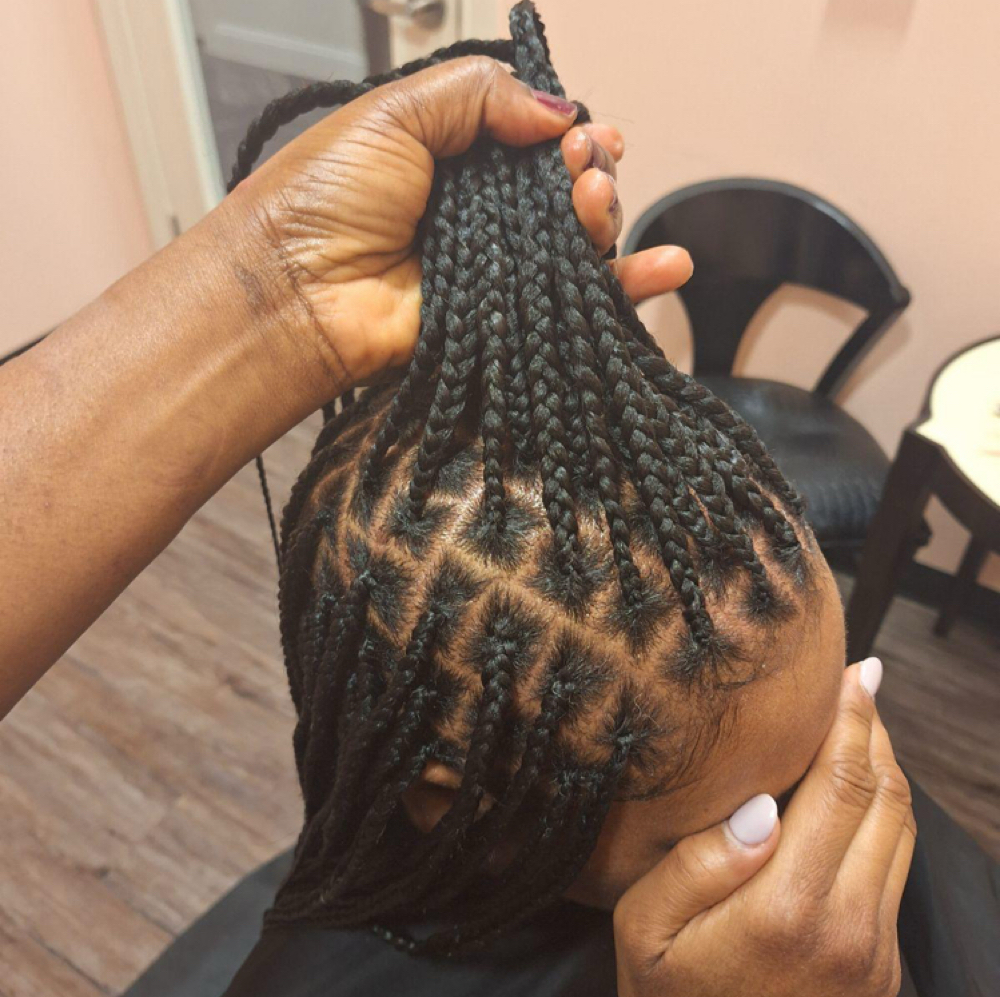 Knotless Braids - Small at WestAfrican Beauty Junction Braids in Prosper, TX