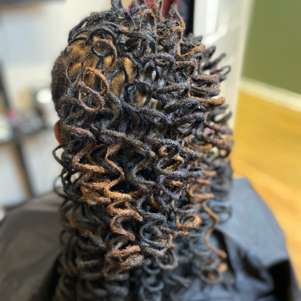 Rod Set On Locs at Styled By Tish in Chicago, IL