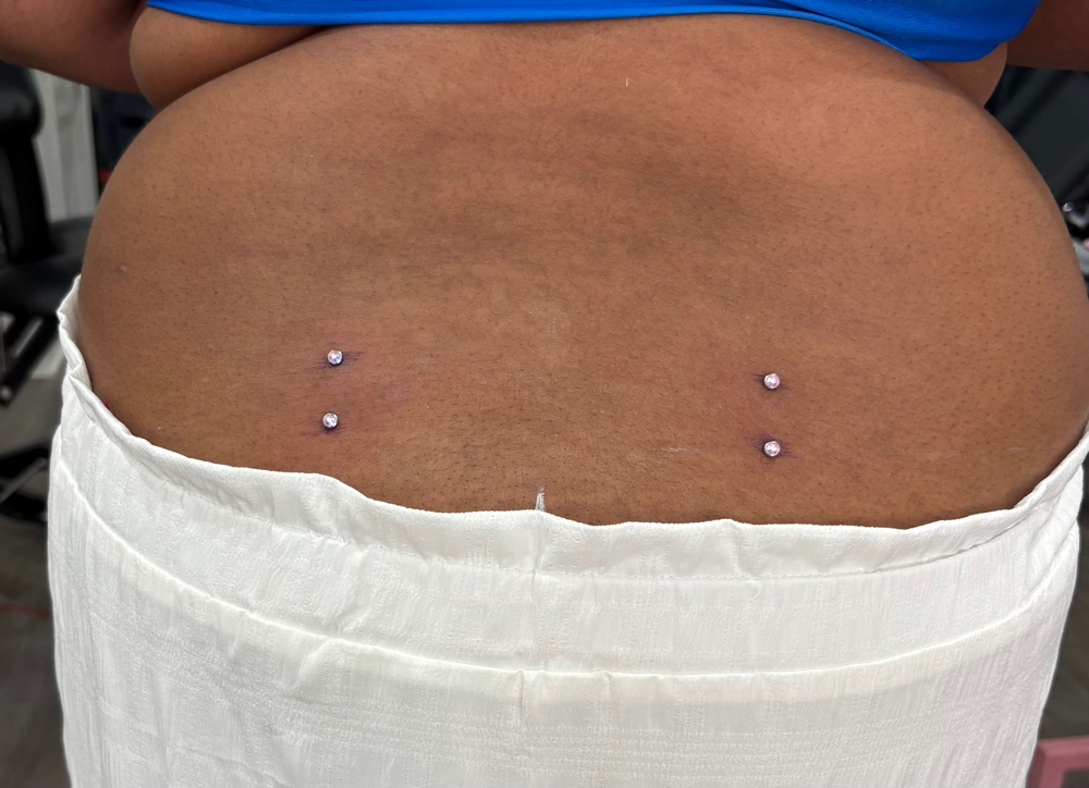 Double Surface Back Piercing